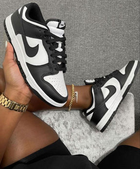 Nike negras con blanco mujer best sale